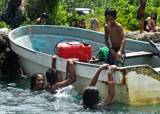 kids on boat