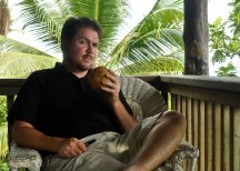 Spencer with a drinking coconut