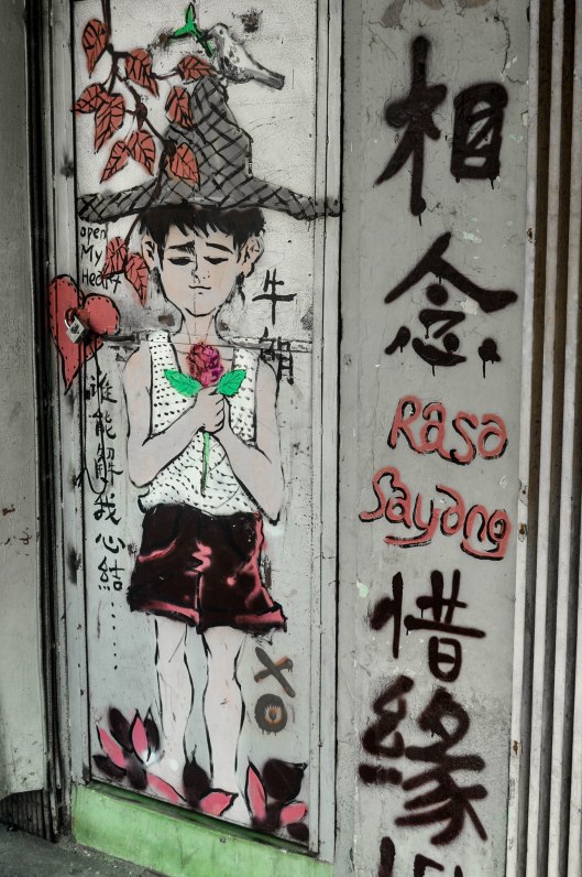 Many places in Chinatown had Rasa Sayang graffiti.  Rasa Sayang means "taste love" in Malay.