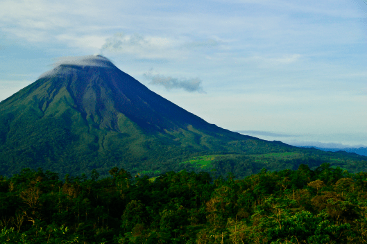 Arenal Volcano (at sunrise), viewed from Leaves and Lizards Cabin Retreat, La Fortuna de San Carlos, Costa Rica