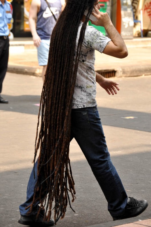 Khao San Road, Bangkok, Thailand. There was really no other title I felt I could give this photo.  He was walking back and forth along Khao San.  My friend who was with me said he had seen him there before.  So. apparently, he is a fixture in this area.